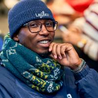 International Anchor Allies Winter 2026 First Mixer -  a seated student poses for picture